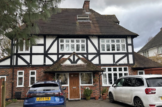 Tudor Lodge - An outside view of the home