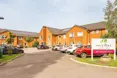 Four Oaks Care Home - An outside view of the home