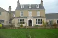 Manor House - An outside view of the home