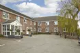 Woodbury Court - An outside view of the home